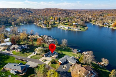 Welcome to this stunning mid-century modern gem, perfectly on Harrison Lake Country Club in Indiana - for sale on GolfHomes.com, golf home, golf lot