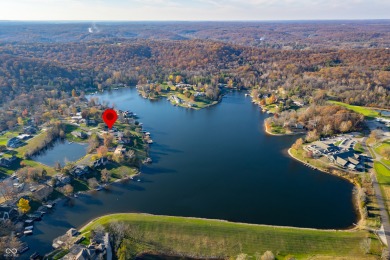 Welcome to this stunning mid-century modern gem, perfectly on Harrison Lake Country Club in Indiana - for sale on GolfHomes.com, golf home, golf lot