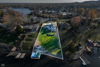 Welcome to this stunning mid-century modern gem, perfectly on Harrison Lake Country Club in Indiana - for sale on GolfHomes.com, golf home, golf lot