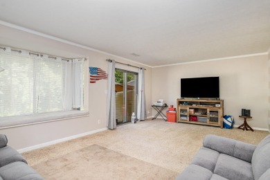 This three-level floor plan townhouse features clean updates and on Boone Links Golf Course in Kentucky - for sale on GolfHomes.com, golf home, golf lot