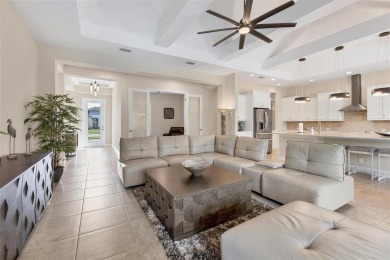 This exquisitely built Napoli Model, Sam Rodgers 3/3/3 home in on Plantation Golf and Country Club in Florida - for sale on GolfHomes.com, golf home, golf lot