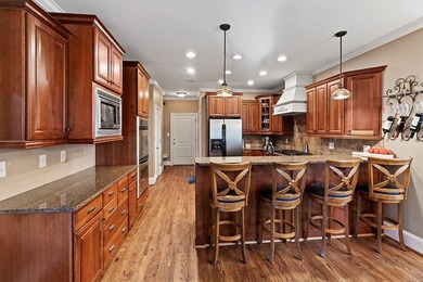 This truly custom residence is rich in architectural detail on The Patriot Golf Club At Grand Harbor in South Carolina - for sale on GolfHomes.com, golf home, golf lot