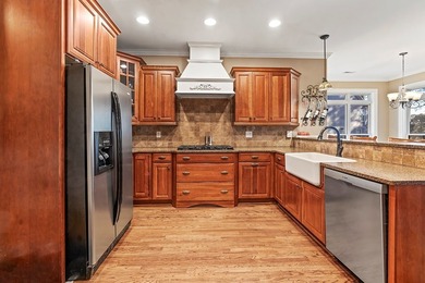 This truly custom residence is rich in architectural detail on The Patriot Golf Club At Grand Harbor in South Carolina - for sale on GolfHomes.com, golf home, golf lot