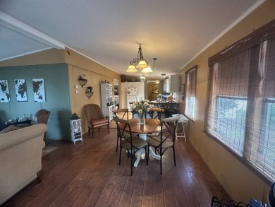 Ready to embrace the Florida lifestyle? This beautifully on Del Tura Golf and Country Club in Florida - for sale on GolfHomes.com, golf home, golf lot