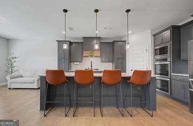 Barely lived in and shows like new, this stunning home is on Traditions of Braselton Golf Club in Georgia - for sale on GolfHomes.com, golf home, golf lot