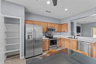 This beautifully maintained and updated Cactus Flower model, is on Cimarron Golf Club in Arizona - for sale on GolfHomes.com, golf home, golf lot