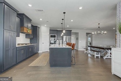 Barely lived in and shows like new, this stunning home is on Traditions of Braselton Golf Club in Georgia - for sale on GolfHomes.com, golf home, golf lot