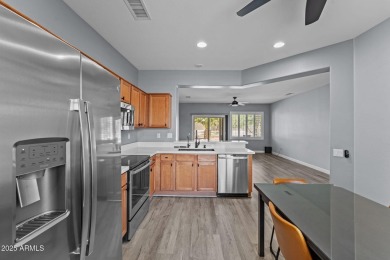 This beautifully maintained and updated Cactus Flower model, is on Cimarron Golf Club in Arizona - for sale on GolfHomes.com, golf home, golf lot
