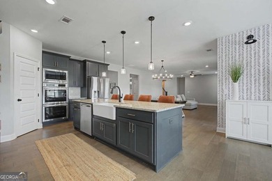 Barely lived in and shows like new, this stunning home is on Traditions of Braselton Golf Club in Georgia - for sale on GolfHomes.com, golf home, golf lot