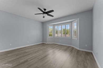 This beautifully maintained and updated Cactus Flower model, is on Cimarron Golf Club in Arizona - for sale on GolfHomes.com, golf home, golf lot