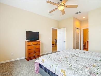 This spacious twin villa showcases breathtaking views of two on Herons Glen Golf and Country Club in Florida - for sale on GolfHomes.com, golf home, golf lot