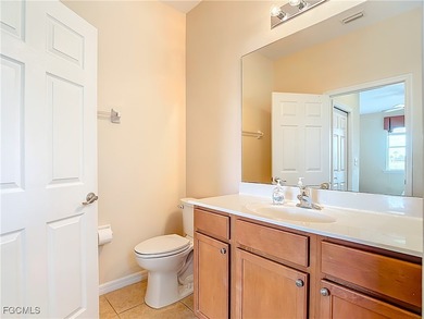 This spacious twin villa showcases breathtaking views of two on Herons Glen Golf and Country Club in Florida - for sale on GolfHomes.com, golf home, golf lot