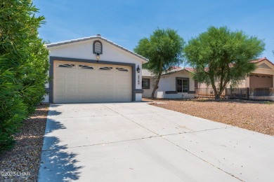 Welcome to this well-maintained 3 bedroom, 2 bathroom home on Desert Lakes Golf Course in Arizona - for sale on GolfHomes.com, golf home, golf lot