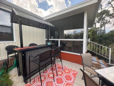 Ready to embrace the Florida lifestyle? This beautifully on Del Tura Golf and Country Club in Florida - for sale on GolfHomes.com, golf home, golf lot