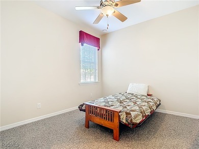 This spacious twin villa showcases breathtaking views of two on Herons Glen Golf and Country Club in Florida - for sale on GolfHomes.com, golf home, golf lot