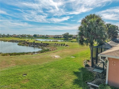 This spacious twin villa showcases breathtaking views of two on Herons Glen Golf and Country Club in Florida - for sale on GolfHomes.com, golf home, golf lot