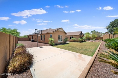 Welcome to this stunning 5 + 1 bedroom, 3-bathroom home nestled on Verrado Golf Club  in Arizona - for sale on GolfHomes.com, golf home, golf lot