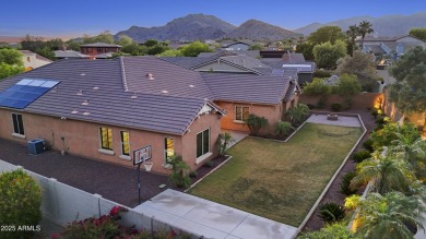 Welcome to this stunning 5 + 1 bedroom, 3-bathroom home nestled on Verrado Golf Club  in Arizona - for sale on GolfHomes.com, golf home, golf lot