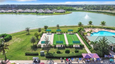 This spacious twin villa showcases breathtaking views of two on Herons Glen Golf and Country Club in Florida - for sale on GolfHomes.com, golf home, golf lot
