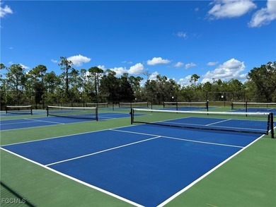 This spacious twin villa showcases breathtaking views of two on Herons Glen Golf and Country Club in Florida - for sale on GolfHomes.com, golf home, golf lot