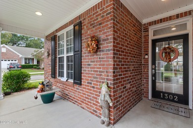 This lovely brick townhome is tucked away in one of Leland's on Magnolia Greens Golf Plantation in North Carolina - for sale on GolfHomes.com, golf home, golf lot