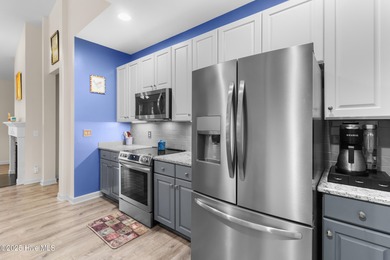 This lovely brick townhome is tucked away in one of Leland's on Magnolia Greens Golf Plantation in North Carolina - for sale on GolfHomes.com, golf home, golf lot