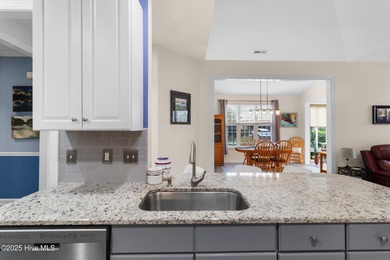 This lovely brick townhome is tucked away in one of Leland's on Magnolia Greens Golf Plantation in North Carolina - for sale on GolfHomes.com, golf home, golf lot