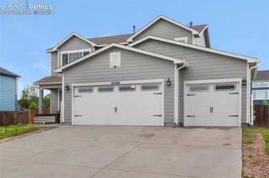 Discover this bright two-story home in the Woodmen Hills on Antler Creek Golf Course in Colorado - for sale on GolfHomes.com, golf home, golf lot