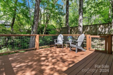 This charming 1900 home was completely remodeled in 2014 on Black Mountain Golf Course in North Carolina - for sale on GolfHomes.com, golf home, golf lot