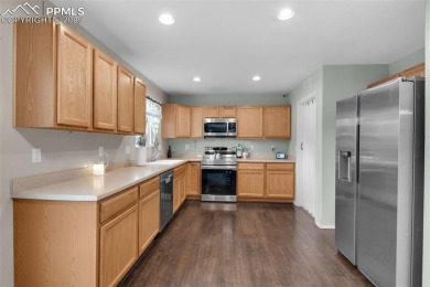 Discover this bright two-story home in the Woodmen Hills on Antler Creek Golf Course in Colorado - for sale on GolfHomes.com, golf home, golf lot