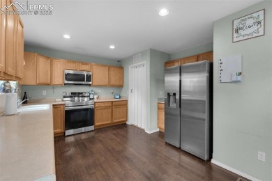 Discover this bright two-story home in the Woodmen Hills on Antler Creek Golf Course in Colorado - for sale on GolfHomes.com, golf home, golf lot