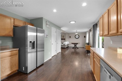 Discover this bright two-story home in the Woodmen Hills on Antler Creek Golf Course in Colorado - for sale on GolfHomes.com, golf home, golf lot