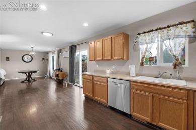 Discover this bright two-story home in the Woodmen Hills on Antler Creek Golf Course in Colorado - for sale on GolfHomes.com, golf home, golf lot