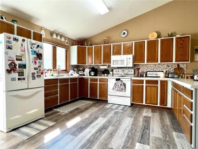 This comfortable two-bedroom townhome in Ortonville has been on Ortonville Muni Golf Course in Minnesota - for sale on GolfHomes.com, golf home, golf lot