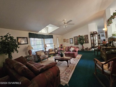 This charming 1995 Palm Harbor home, located in the vibrant 55+ on Pine Shadows Golf Course in Arizona - for sale on GolfHomes.com, golf home, golf lot