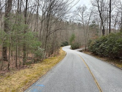 Nice winter mountain views of Chimneytop Mountain and on Sapphire National Golf Club in North Carolina - for sale on GolfHomes.com, golf home, golf lot