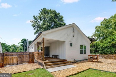 Welcome to this beautifully renovated 3-bedroom, 2-bathroom home on John A. White Golf Course in Georgia - for sale on GolfHomes.com, golf home, golf lot