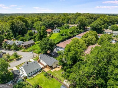 Welcome to this beautifully renovated 3-bedroom, 2-bathroom home on John A. White Golf Course in Georgia - for sale on GolfHomes.com, golf home, golf lot