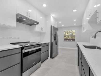 Step into elegance with this beautifully redesigned 2 bedroom on Wynmoor Golf Course in Florida - for sale on GolfHomes.com, golf home, golf lot