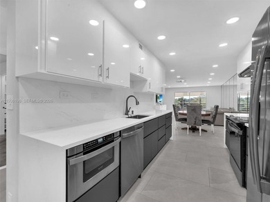 Step into elegance with this beautifully redesigned 2 bedroom on Wynmoor Golf Course in Florida - for sale on GolfHomes.com, golf home, golf lot