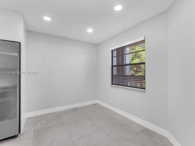 Step into elegance with this beautifully redesigned 2 bedroom on Wynmoor Golf Course in Florida - for sale on GolfHomes.com, golf home, golf lot