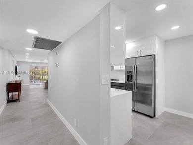 Step into elegance with this beautifully redesigned 2 bedroom on Wynmoor Golf Course in Florida - for sale on GolfHomes.com, golf home, golf lot