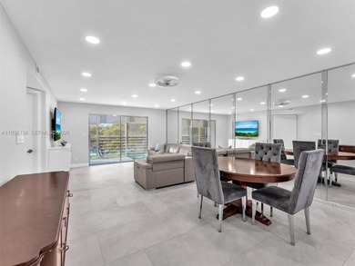 Step into elegance with this beautifully redesigned 2 bedroom on Wynmoor Golf Course in Florida - for sale on GolfHomes.com, golf home, golf lot