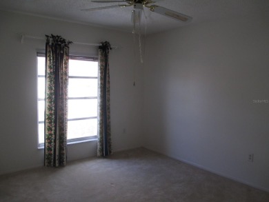 Under contract-accepting backup offers. Room to Roam in this on The Dunedin Country Club in Florida - for sale on GolfHomes.com, golf home, golf lot