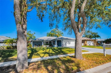 BEAUTIFULLY REMODELED and UPDATED home nestled in the highly on Highland Lakes Executive Golf Course in Florida - for sale on GolfHomes.com, golf home, golf lot