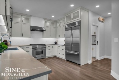 Not a single detail was spared in this sprawling custom brick on St Clair River Country Club in Michigan - for sale on GolfHomes.com, golf home, golf lot