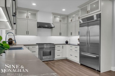 Not a single detail was spared in this sprawling custom brick on St Clair River Country Club in Michigan - for sale on GolfHomes.com, golf home, golf lot