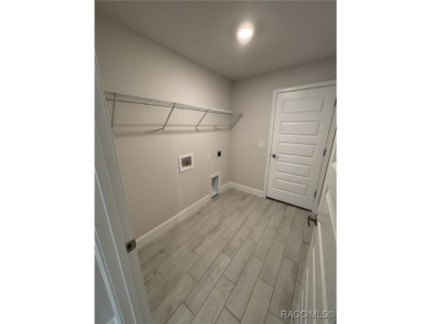 Brand New Quality Built Construction in Desirable Pine Ridge on Pine Ridge Community Golf and Country Club in Florida - for sale on GolfHomes.com, golf home, golf lot