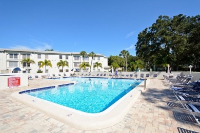 Under contract-accepting backup offers. Room to Roam in this on The Dunedin Country Club in Florida - for sale on GolfHomes.com, golf home, golf lot