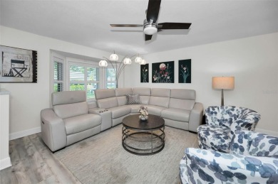 BEAUTIFULLY REMODELED and UPDATED home nestled in the highly on Highland Lakes Executive Golf Course in Florida - for sale on GolfHomes.com, golf home, golf lot